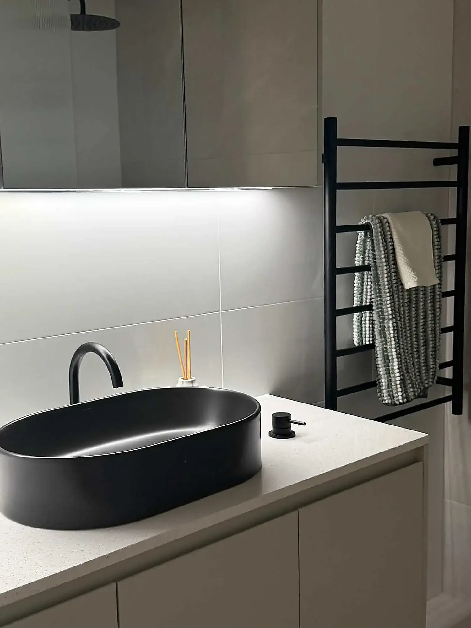Vanity with matte black basin