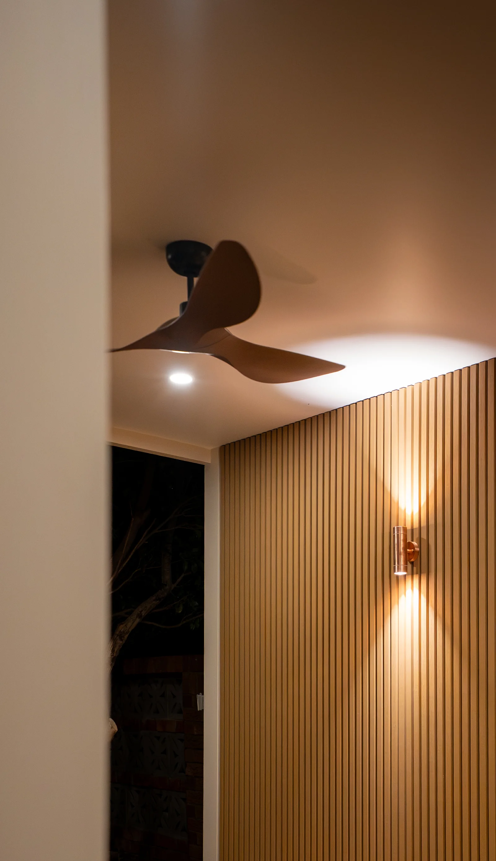 Ceiling fan and lined ceiling at night